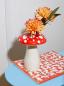 Preview: Moderne Tischdeko im Cottagecore-Stil mit der Amanita Pilz-Vase und bunten Blumen.