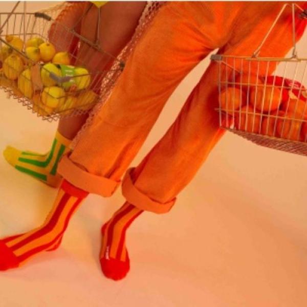 Originelle Verpackung der Juicy Oranges Socken im Obst-Netz-Look